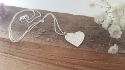 Floral pattern silver heart pendant