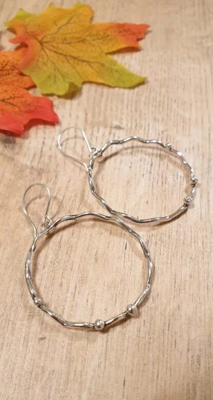 Wavy Silver hoop earring